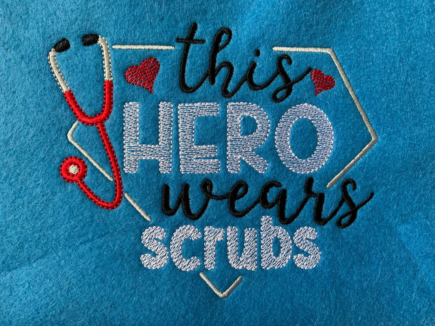 This hero wears scrubs - 3 Sizes - Digital Embroidery Design