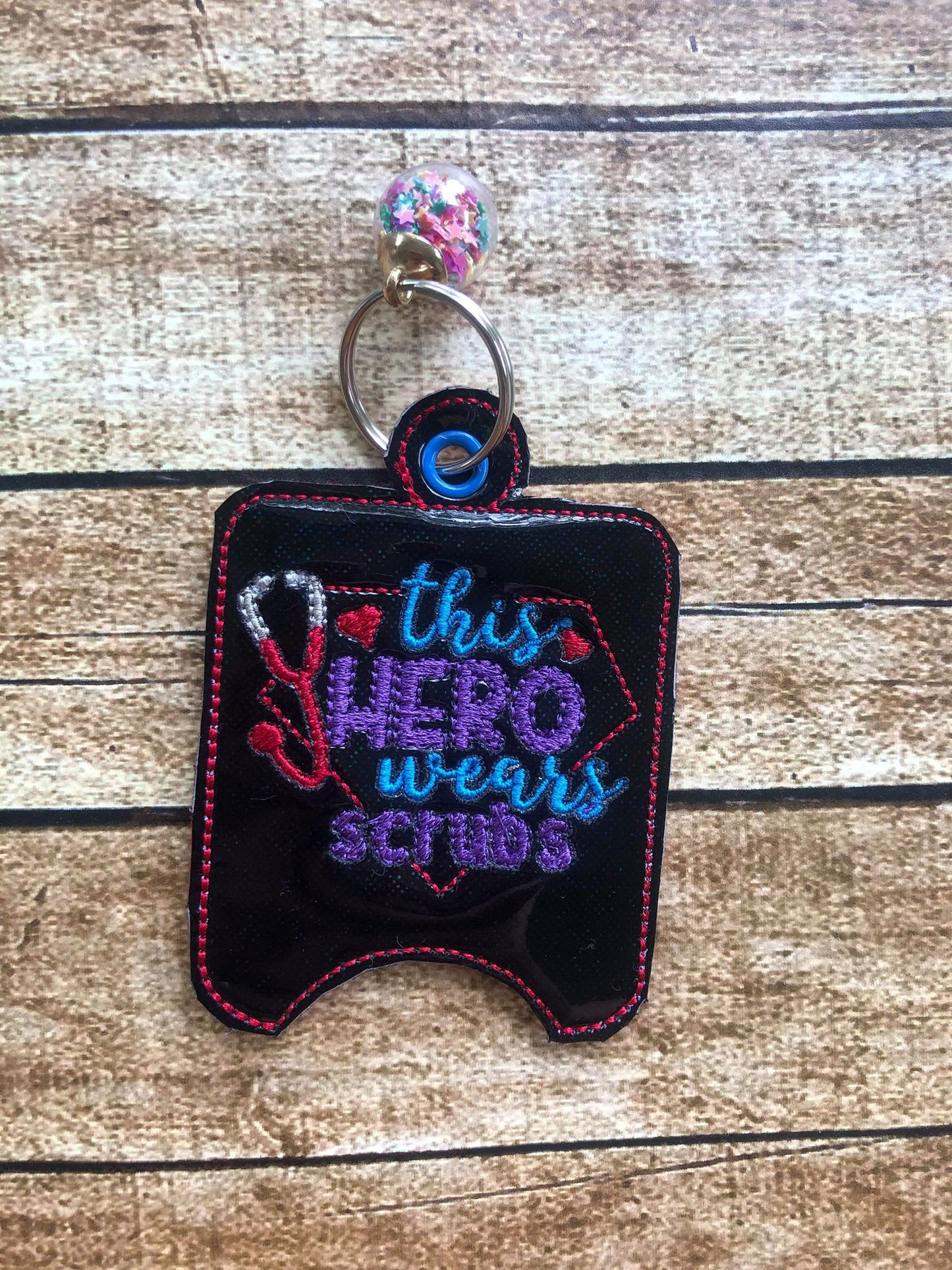 This Hero Wears Scrubs Sanitizer Holders - DIGITAL Embroidery DESIGN